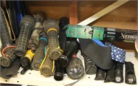 shelf lot: 18 flashlights, bin of hamer handles