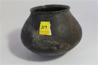 CARVED OLLA WITH FLINT AND POINTS INSIDE