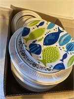 Large assortment of plates and some bowls