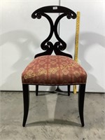 Black Victorian style chair with padded seat