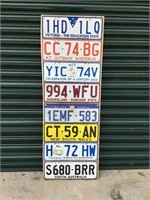 Set of Aussie Number Plates on Display Board