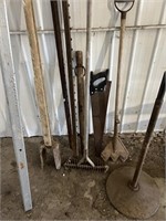 Post hole digger, saw, fence post, misc