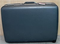 Vintage Tourister Rolling Suitcase