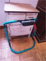 1920s era kitchen cabinet base and an ab roller