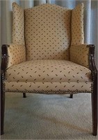 Upholstered High Back Arm Chair.