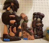 Three carved pieces - all featuring mothers and