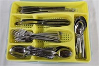 Assortment of flatware in tray in Rubbermaid