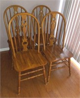 4 matching wooden chairs
