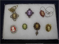 5 BEJEWELED CAMEO PENDANTS AND 2 NECKLACES WITH
