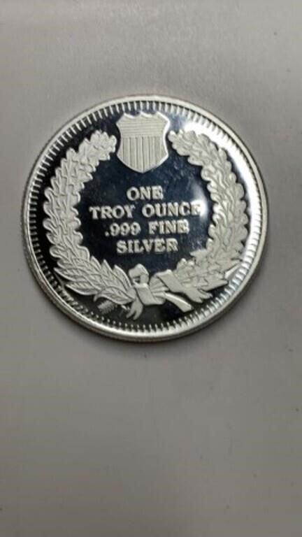 One TROY ounce .999 fine silver round