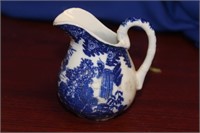 A Small Japanese Blue and White Creamer