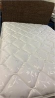 Queen size bed with beautiful braided headboard