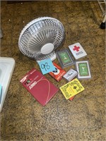 small fan and playing cards