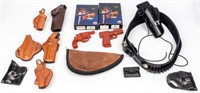 Lot of 8 Leather Holsters With Training Guns