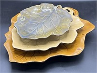 Three ceramic leaf plates