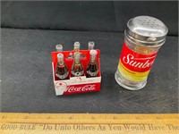 Toothpick dispenser and coke