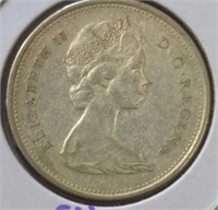 Silver 1965 Canadian quarter