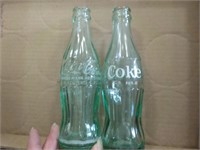 2 Coca-Cola bottles Charleron + Juneau, Alaska
