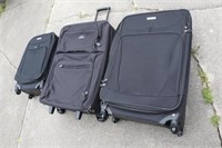 Rolling suitcases and misc bags