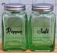 Green glass salt and pepper shakers