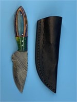 Damascus bladed hunting knife with multi-colored h