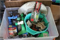 Clear Tote Full of Gardening Items