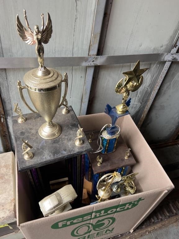 Assorted car show trophies
