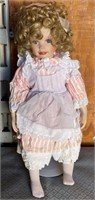 11 - COLLECTIBLE DOLL (J22)