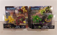 Two Sealed He-Man Figures