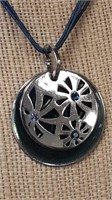 Large metal and blue stone pendant on 16 in three