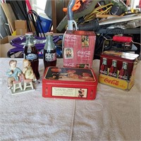 Coca-Cola tins, soda bottles and figurine nos