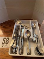Assortment of Miscellaneous Silverware in White