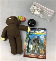 Teddy bear, 2 yo-yos, and military action figure