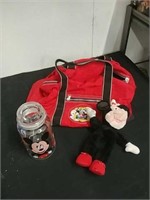 Mickey duffle bag with stuffed Minnie Mouse and