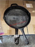 Two Older Tramontina Cast Iron pans