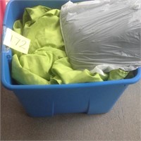 Tub of green table cloths