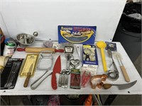 Lot of kitchen silverware and gadgets