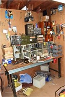 6' workbench with assorted hardware and supplies;