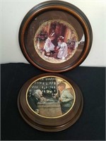 Two framed collectible plates