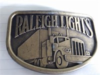RALEIGH LIGHTS BELT BUCKLE WITH SEMI ON IT