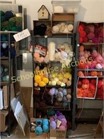 Metal shelving unit with yarn and more