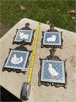 4- Farm animal cast iron trivets- goose broken