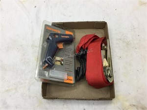 Glue gun and ratchet strap