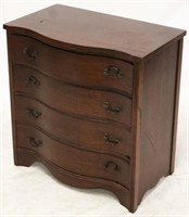 Serpentine front mahogany bachelor's chest