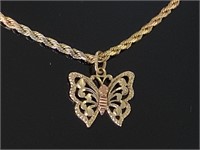 14K chain with butterfly pendant.