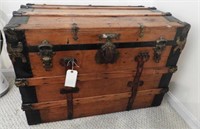 Antique flat top steamer trunk completely