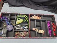 2 trays of costume jewelry in adjustable jewelry