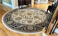 $$ 10' Hand Knotted Round Rug in Entryway