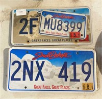 Group of five license plates
