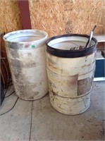 Two barrels, one full of misc  metal